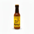 Bottle of Mago hot sauce with a yellow label on a white background