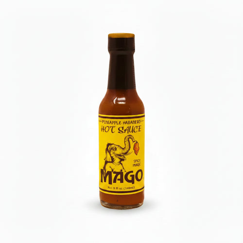 Bottle of Mago hot sauce with a yellow label on a white background