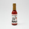 Bottle of Mago hot sauce on a white background