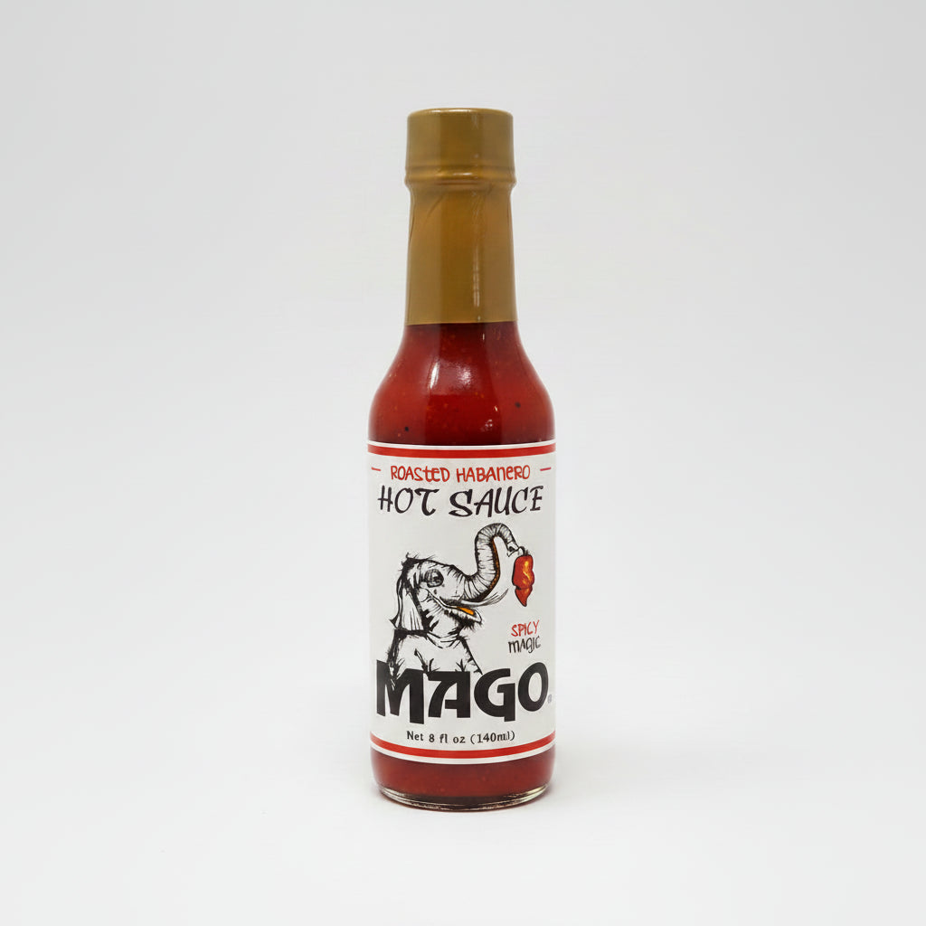 Bottle of Mago hot sauce on a white background